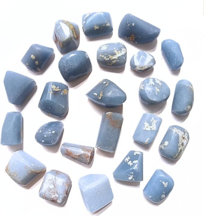 Tumbled angelite stones — soft powder-blue flecked with white
